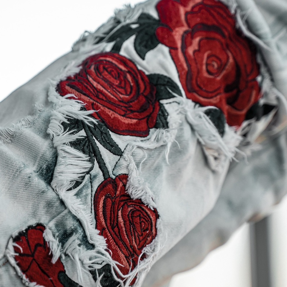 Golden denim, rose patch jeans